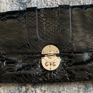 White House Black Market Black Embossed Clutch